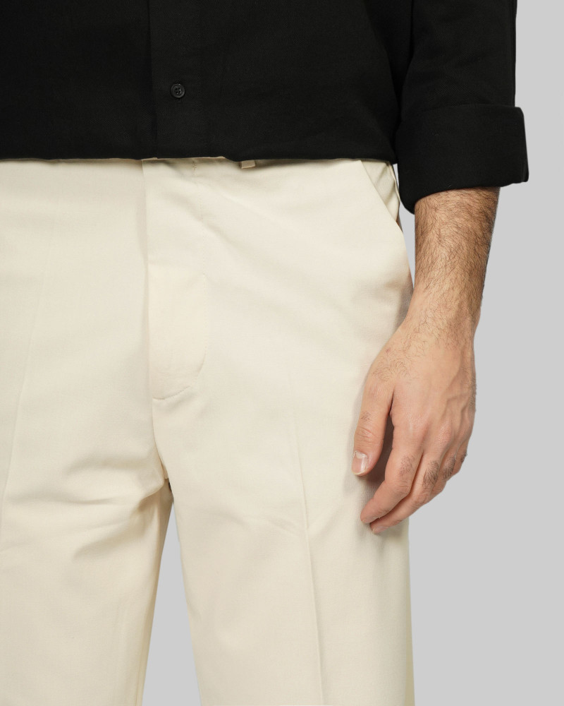 شلوار پارچه ای مردانه رگولار کرم روشن 24462130